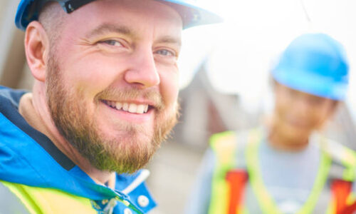 male site engineer poses for the camera