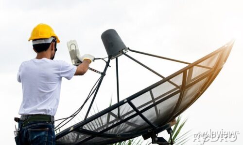 technician-is-installing-satellite-receiver-700-204210670